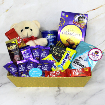 Deluxe Gift Combo - Teddy 6 inch, Harsheys Kisses Cookies & Cream, Harsheys Creamy Milk Chocolate, Cadbury Celebrations Milk Chocolate, Mini Oreo, Dark Fantasy, 2 Nescafe Milkybar, 8 Dairy Milk, Kitkat Share & Snap, 2 Kit Kat, 3 Personalized Props, Kraft